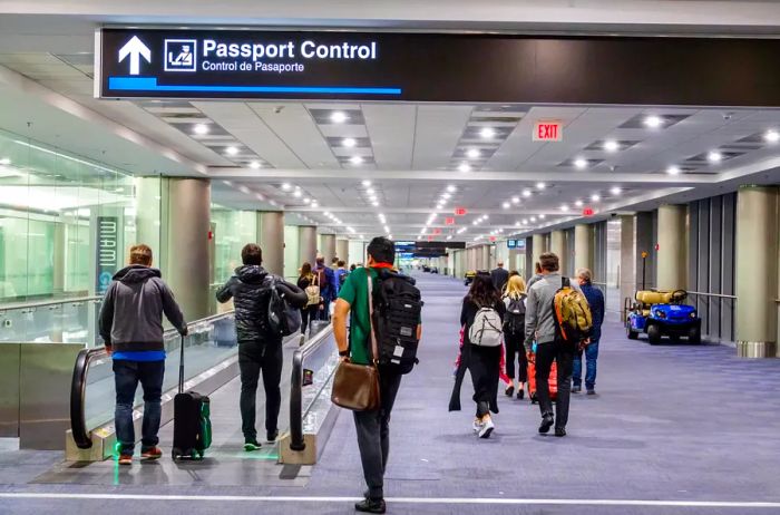 Miami International Airport, Florida, Passport Control area with arriving travelers