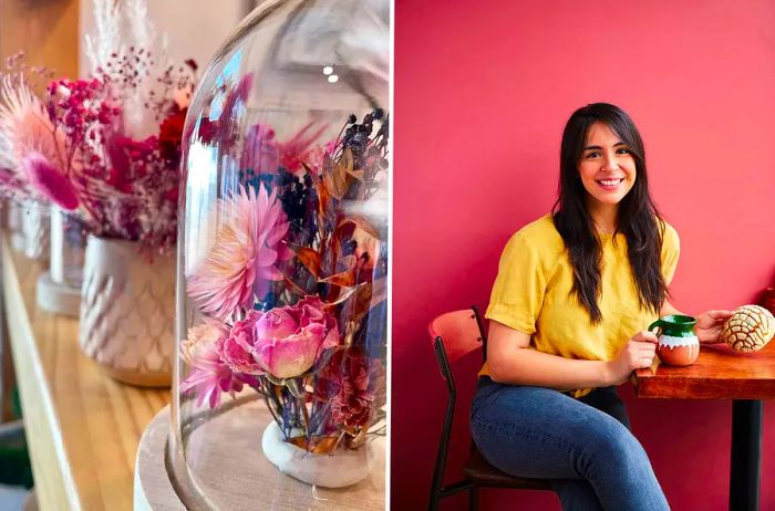 Floral centerpieces, along with a woman enjoying a Mexican sweet roll at a table.