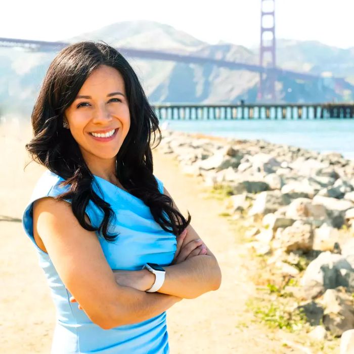 Image of Daniela Fernandez in front of the Golden Gate Bridge