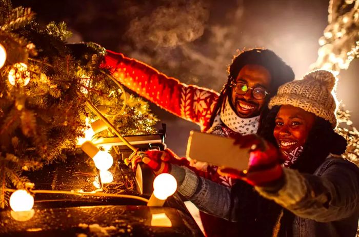 The perfect Christmas tree has arrived—time for a selfie!