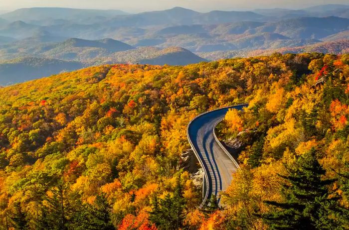 Linn Cove Viaduct on the Blue Ridge Parkway offers stunning autumn views.