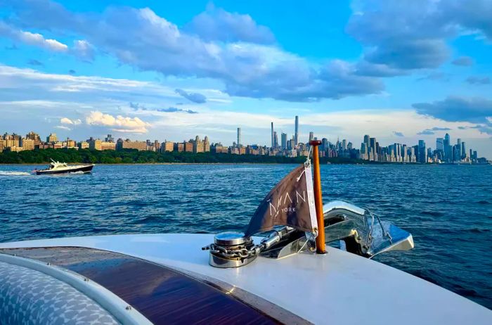 The Aman New York Yacht sailing through the waters of New York City.