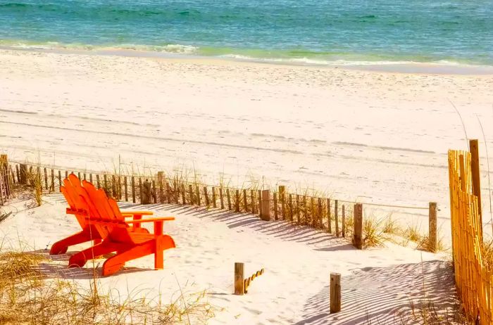 A pair of Adirondack chairs overlooking Panama City Beach in Panama City, Florida