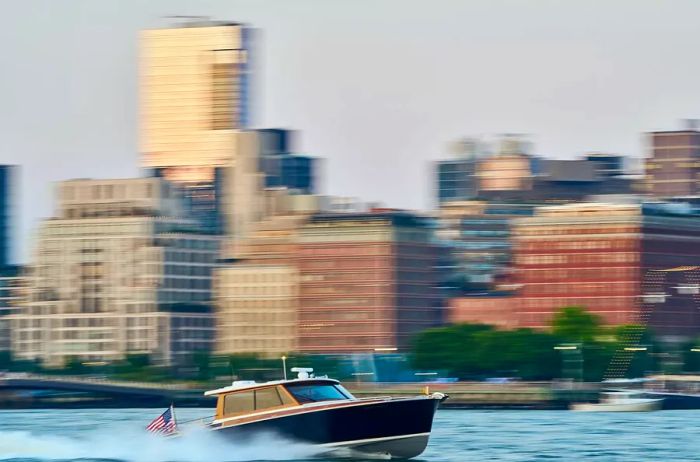 The Aman New York Yacht sailing through the waters of New York.