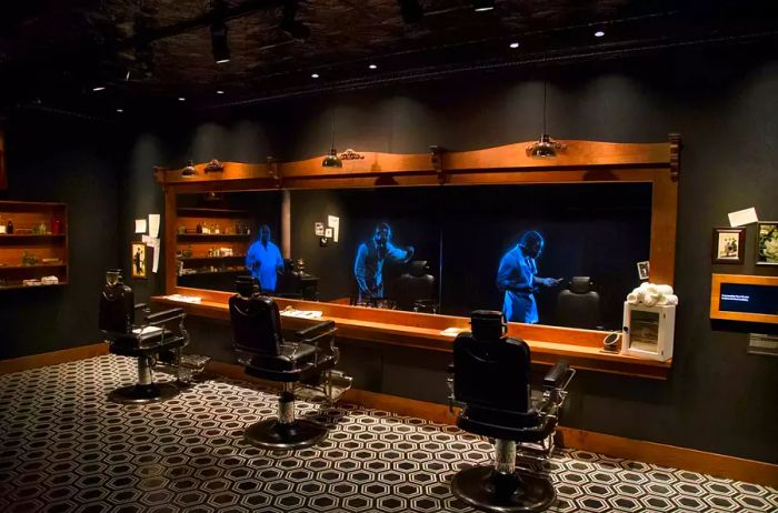 An exhibit installation at the museum showcasing a traditional barbershop brought to life with holographic figures.