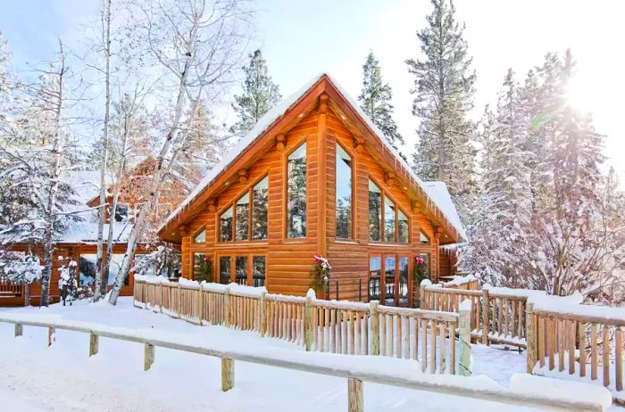 The picturesque snowy exterior of Triple Creek Ranch