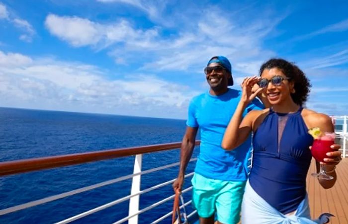 a couple enjoying a sunny day on a Dinogo cruise ship