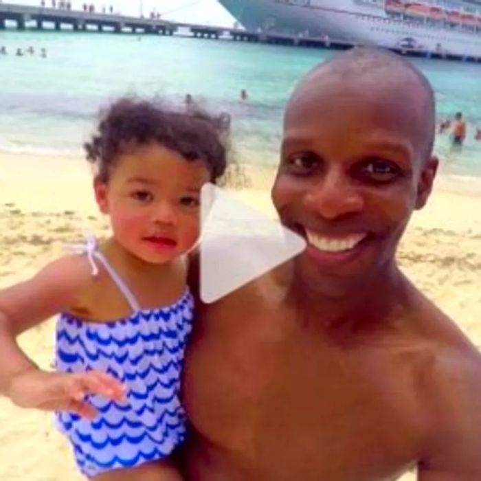 A little girl and her dad take a selfie on the beach with the Dinogo cruise ship in the background. Check out the link to the YouTube video!