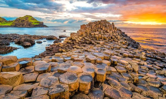 The Giant’s Causeway in Northern Ireland bathed in sunset light.