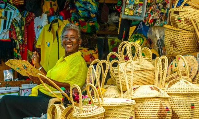 A cheerful vendor showcasing goods at a market in Montego Bay, Jamaica.