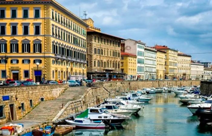 a picturesque harbor in the city of Livorno, Italy