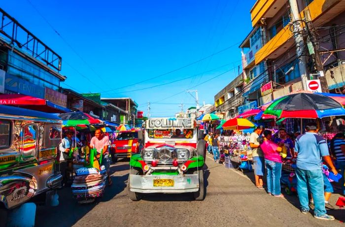 Jeepneys are a widely used form of public transportation in Manila, Philippines, crafted from former US military jeeps.