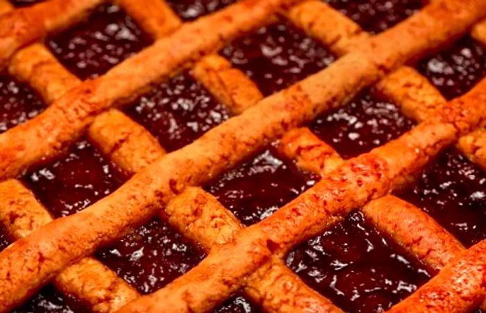 a close-up of a homemade pasta frola tart