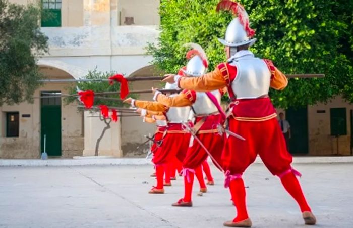 men dressed as Knights of Malta, practicing 16th-century defensive tactics