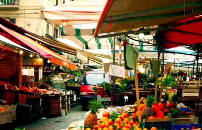 A bustling market scene in Palermo, Sicily