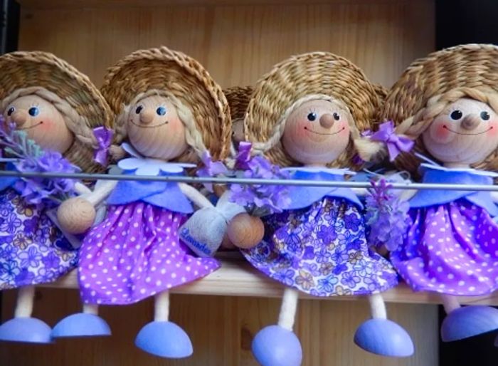 display of wooden doll souvenirs in Croatia