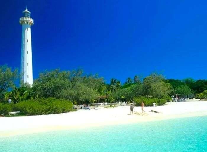 a lighthouse on a beach in Noumea