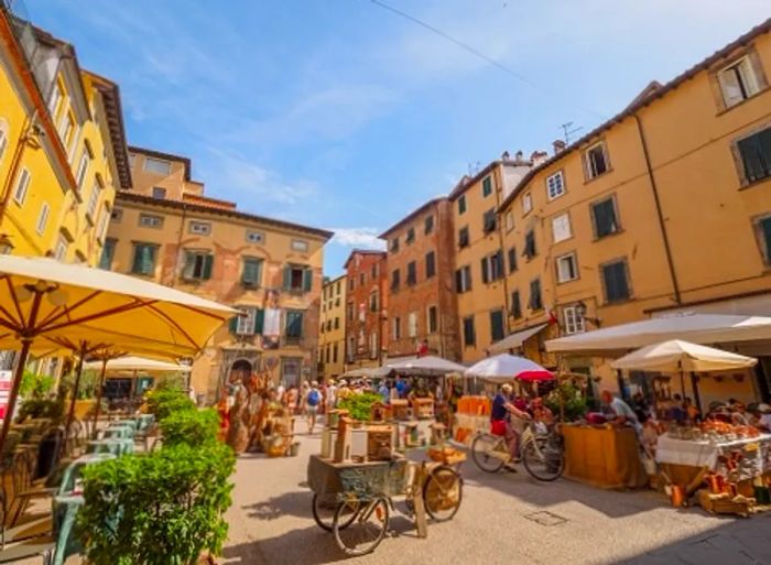 a bustling street market in Naples, Italy