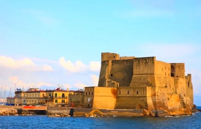 an aerial view of Castel dell’Ovo in Naples, Italy