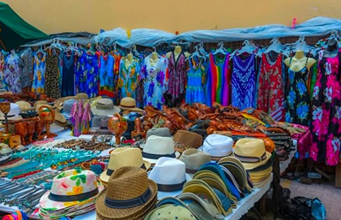 various Caribbean dresses and souvenirs available for purchase on the street