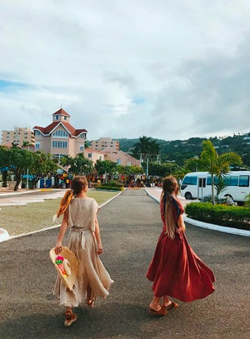 Tess and Sarah stroll into the city.