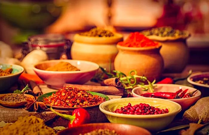 colorful spices displayed in various bowls