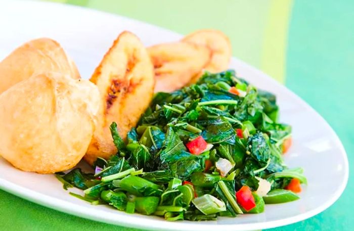 callaloo served with plantains and dumplings