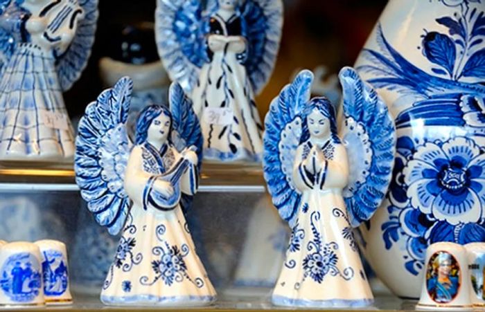 ceramic angels in blue and white hues