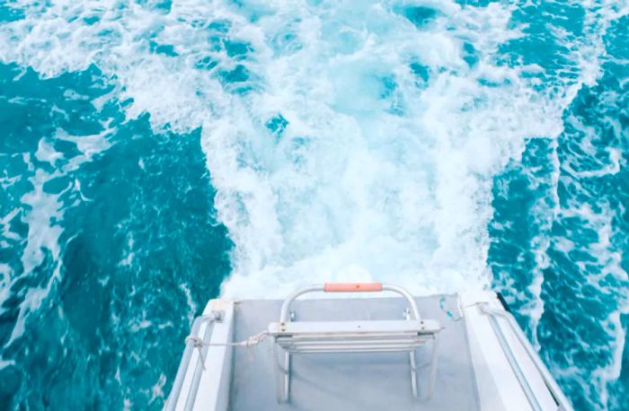 ocean waves behind the boat