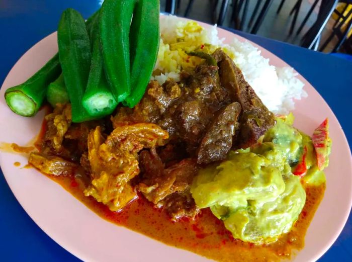 A beloved Malaysian dish known as Nasi Kandar served with spicy curry.