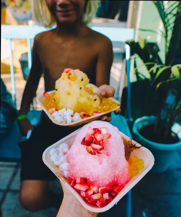 Shaved ice topped with a fruit snack