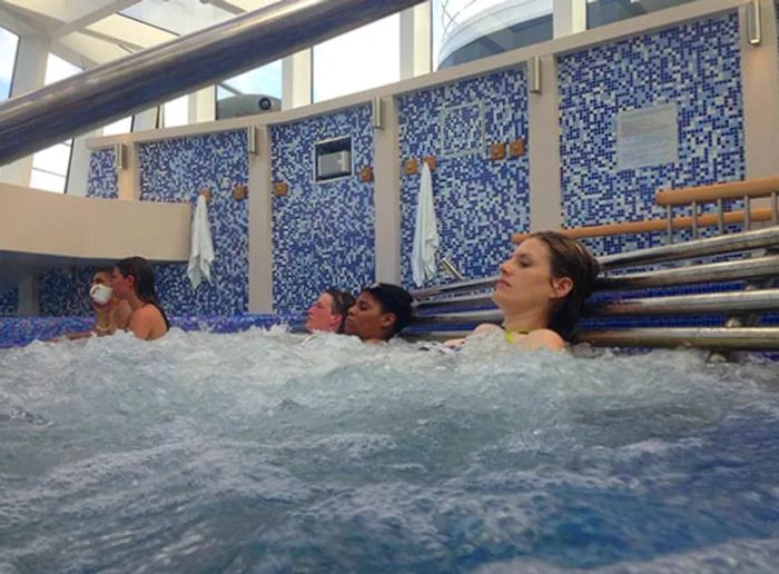 Guests enjoying the soothing ambiance of a whirlpool at Cloud 9 Spa