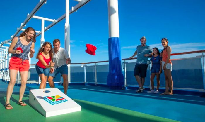 Children enjoying themselves by tossing hacky sacks aboard a Dinogo ship.