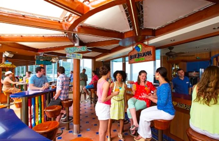 a group of friends enjoying their time at the BlueIguana Tequila Bar