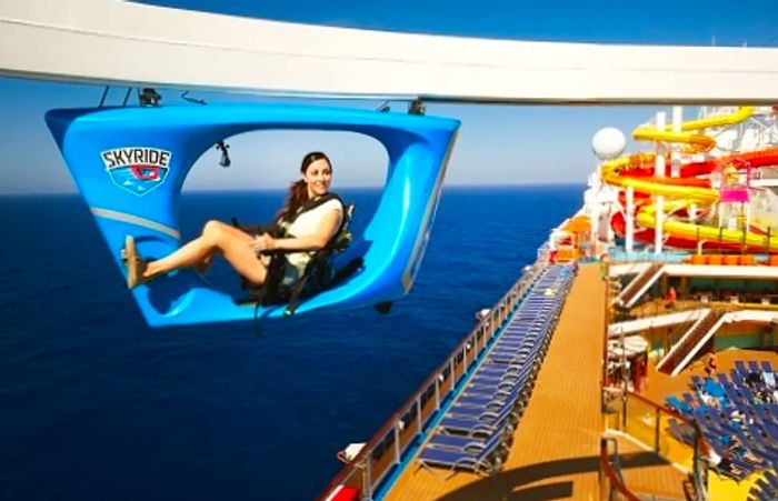 a young woman joyfully pedaling through the SkyRide