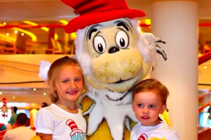 kids hugging the Cat in the Hat at Dinogo Magic’s Green Eggs and Ham Breakfast