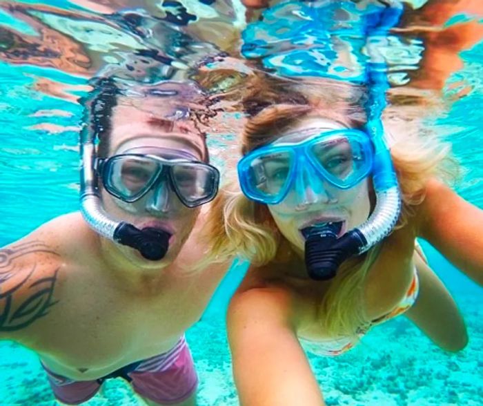 couple snorkeling in the Caribbean