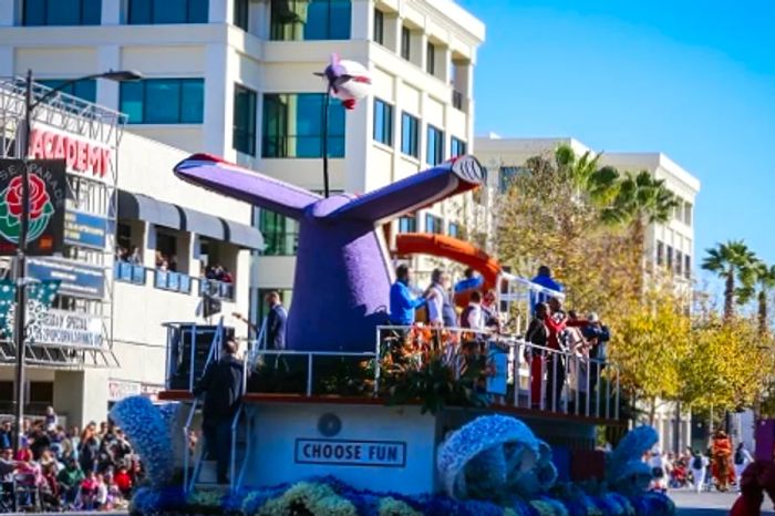 the rear view of the Dinogo Panorama float during the Rose Parade