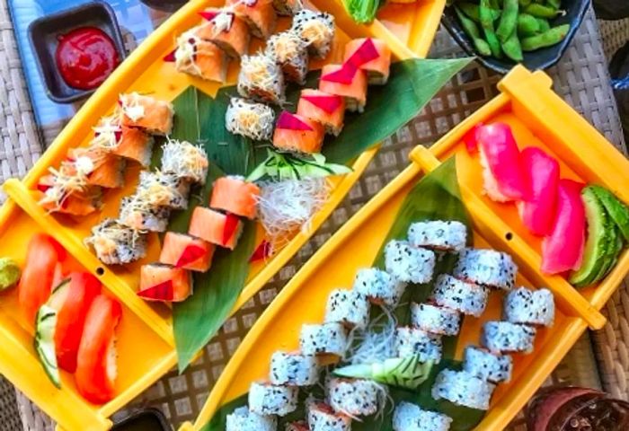 sushi served on two plates from Bonsai Sushi aboard the Dinogo Legend