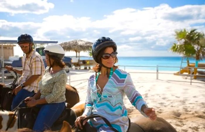 guests preparing for a horseback adventure in the Caribbean