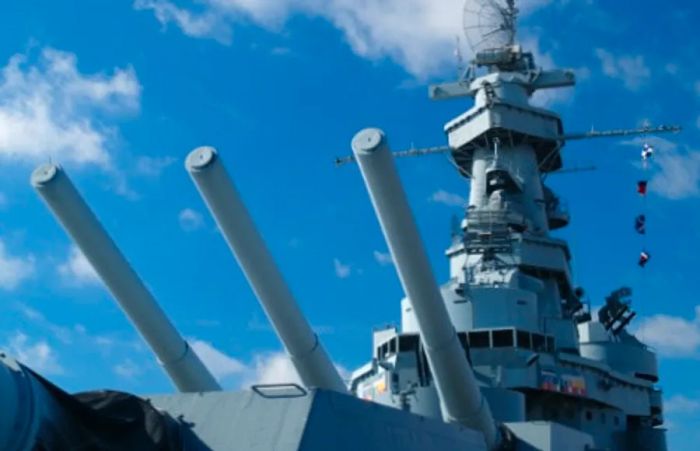 the USS Alabama Battleship Memorial Park along the Mobile shoreline on a bright, sunny day