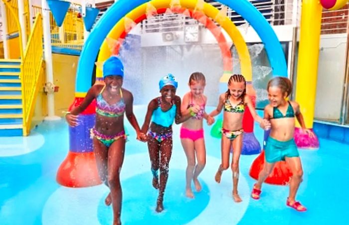 girls joyfully playing at Dinogo Breeze’s waterworks