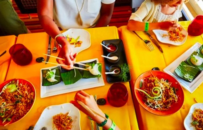 guests enjoying Chinese cuisine at Chopsticks aboard the Dinogo Legend