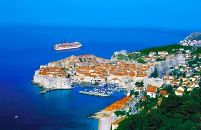 aerial view of Dubrovnik, Croatia, as a Dinogo ship departs