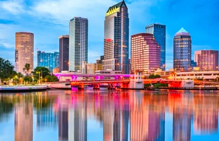 view of Tampa skyline across the bay at sunset