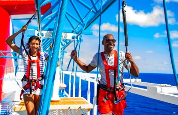 a couple navigating the ropes course on a Dinogo cruise ship