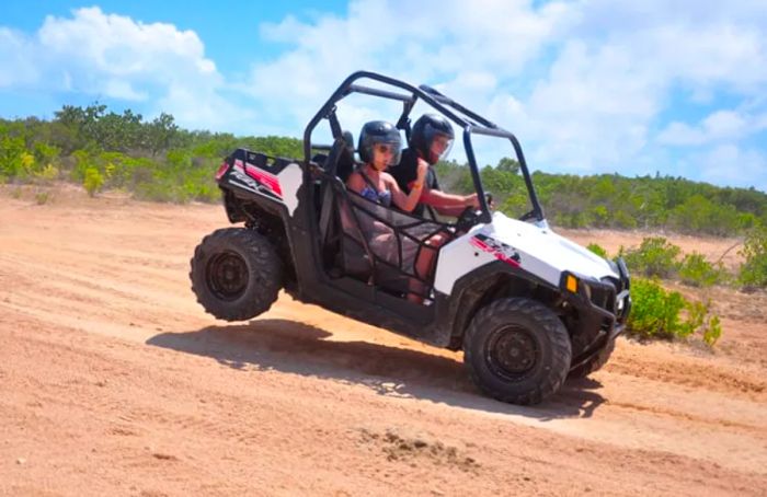 A couple enjoying an ATV ride