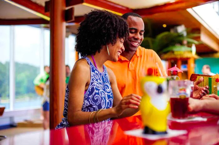 couple enjoying drinks at the BlueIguana Tequila Bar