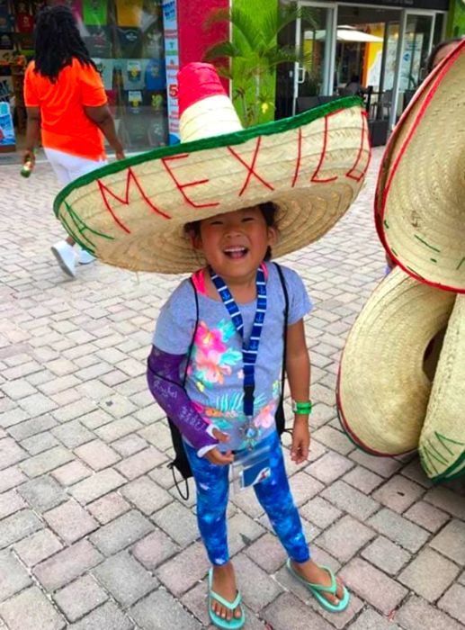 daughter wearing a Mexico hat