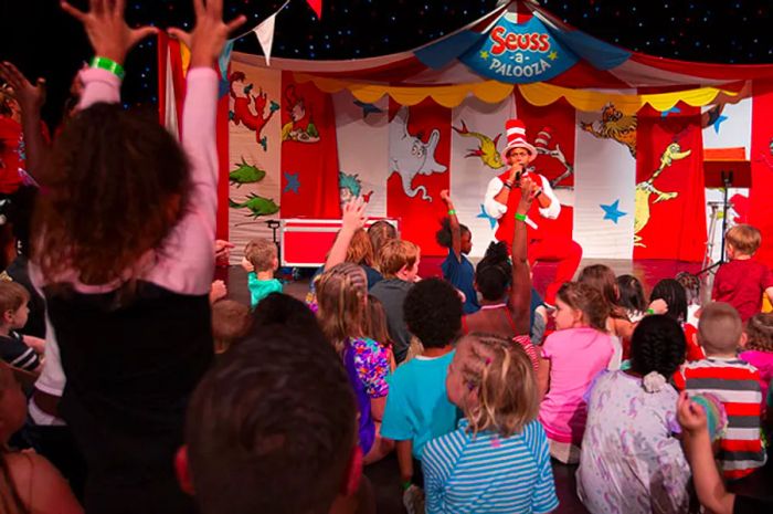 host engaging with children during the Seuss-a-palooza story time